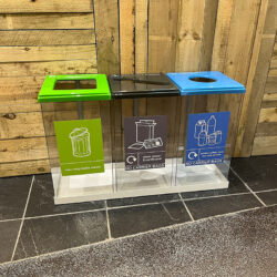 Box Cycle Triple Recycling Bin with transparent bodies and black, blue and green lids.