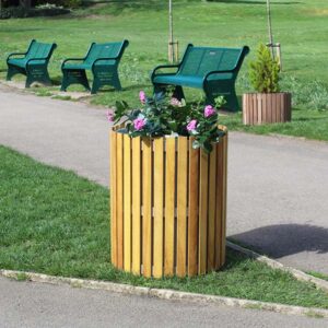 Wyatt Wooden Circular Flower Planter in Iroko light stain.
