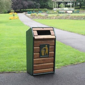 RLA/5 Timber Fronted Litter Bin in dark oak at a park.