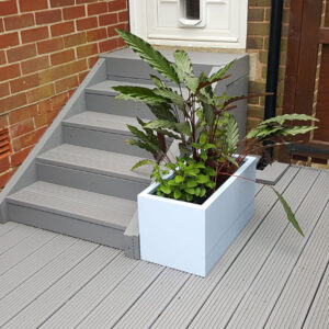 Pastel Blue Rectangular Flower Planter on grey garden decking.