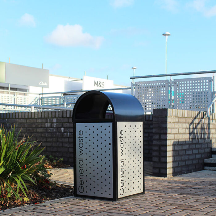 The Royal Parks 112-Litre Galvanised Steel Litter Bin outside M&S.