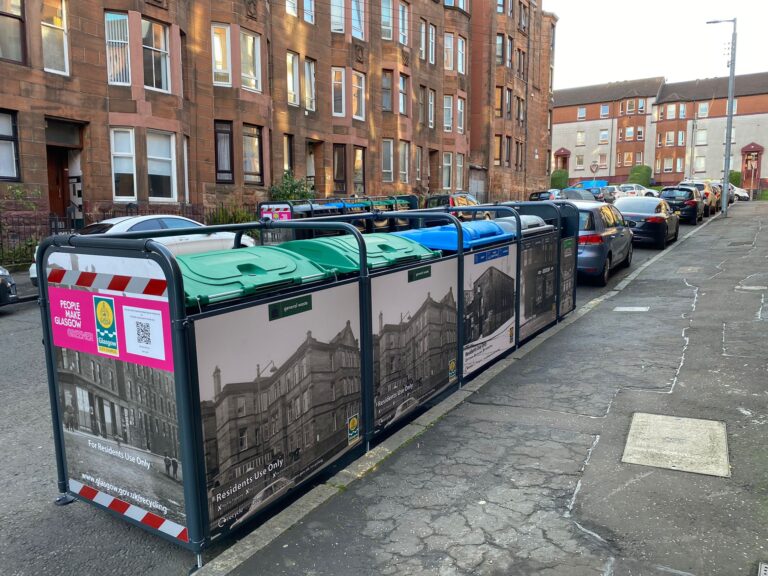 Glasgow Bin Hubs showing four different waste compartments on a street in Glasgow.