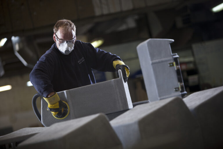 A litter bin being manufactured.