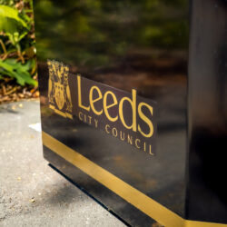 Leeds City Council logo displayed on a custom Wybone litter bin manufactured for a city-wide cleansing initiative.